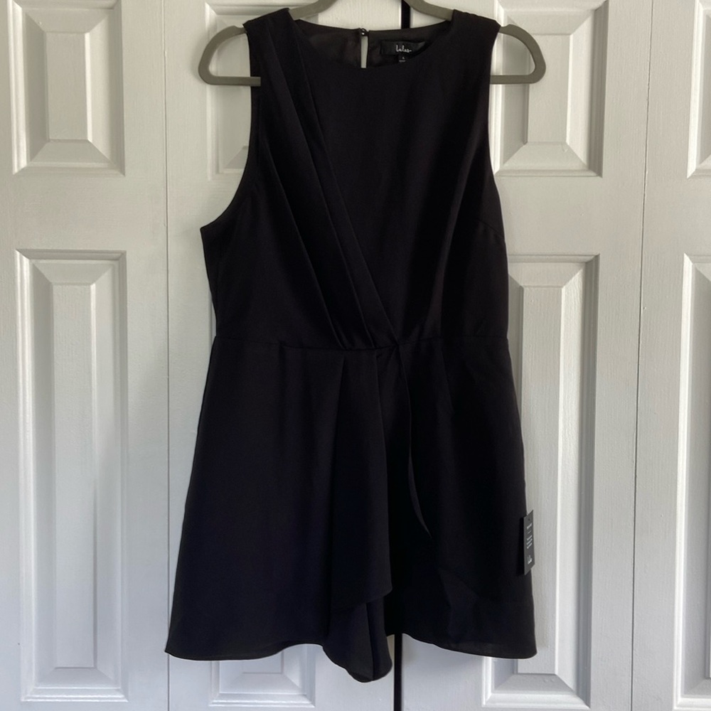 Size large, Lulu’s romper. Black. Never been worn with tags!